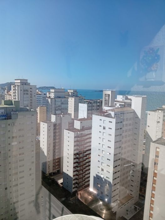 Flat sala living, uma quadra da praia Pitangueiras. Guarujá